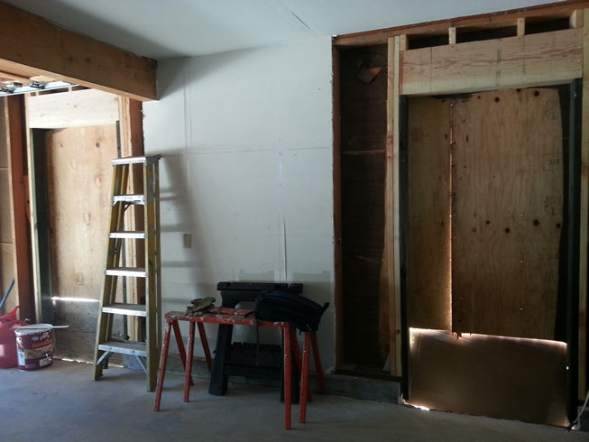 Two new door openings into new garage/workshop.