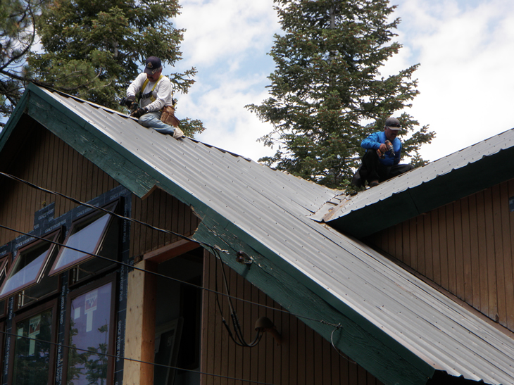 'Riding the ridge line' three stories up!