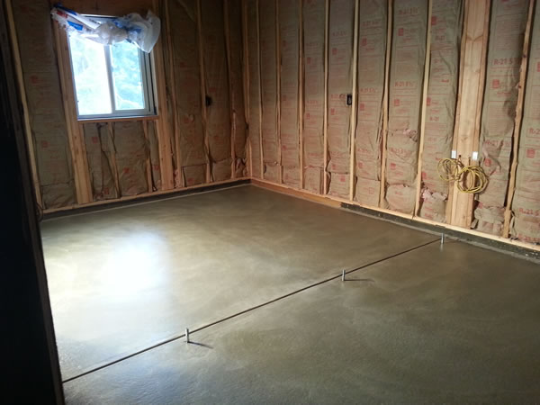 Replacement slab in the new garage/workshop area.